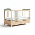 Wooden crib with storage drawer and safety rails in natural green 120 x 60 x 80cm